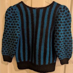 JH Collectibles Blue and Black Patterned Sweater